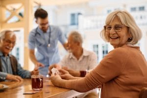 Smiling older woman in a senior living community