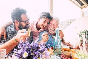 Fathers Day celebration with older adult, son, and grandson