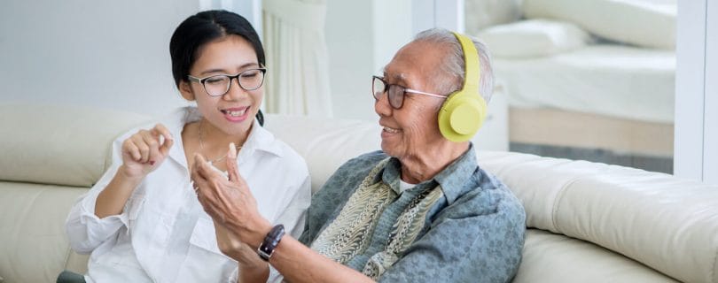 Older adult getting support from a caregiver